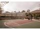 Outdoor basketball and tennis courts in a park-like setting with a shaded picnic area at 1865 Woodhaven Dr, Henderson, NV 89074
