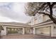 Exterior shot of home showing three-car garage at 1865 Woodhaven Dr, Henderson, NV 89074