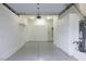 Epoxy floor in garage with cabinets for storage at 1865 Woodhaven Dr, Henderson, NV 89074