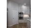 Bright kitchen with white cabinets, stainless steel appliances and built in oven and microwave at 1865 Woodhaven Dr, Henderson, NV 89074