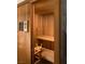Inviting in-home sauna with wooden benches and walls, promising relaxation and wellness at 1865 Woodhaven Dr, Henderson, NV 89074