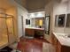 Spacious bathroom with a separate shower, double vanity, and vanity table at 1901 Rolling Dunes Ct, Las Vegas, NV 89117