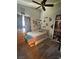 Cozy bedroom featuring carpet floors, a ceiling fan, and a comfortable bed, perfect for relaxation at 1901 Rolling Dunes Ct, Las Vegas, NV 89117