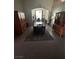 Cozy dining room featuring a table with seating for eight and wooden furniture at 1901 Rolling Dunes Ct, Las Vegas, NV 89117