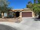 Charming single-story home with desert landscaping, concrete driveway and covered porch at 1901 Rolling Dunes Ct, Las Vegas, NV 89117