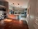 Well-lit kitchen with tile flooring, neutral paint, eat-in bar and stainless steel appliances at 1901 Rolling Dunes Ct, Las Vegas, NV 89117