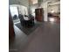 Open-concept living and dining space with hardwood floors and natural light at 1901 Rolling Dunes Ct, Las Vegas, NV 89117