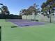 Community tennis court offers a place to enjoy outdoor activity and competition at 1901 Rolling Dunes Ct, Las Vegas, NV 89117