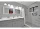 Modern bathroom with dual vanity, walk-in shower, and stylish tile work at 2080 Karen Ave # 1, Las Vegas, NV 89169