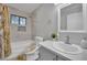 Well-lit bathroom with a tub and shower combo and a modern vanity at 2080 Karen Ave # 1, Las Vegas, NV 89169