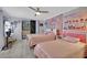 Bright bedroom with two twin beds and personalized decor at 2080 Karen Ave # 1, Las Vegas, NV 89169