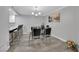 Dining area with modern furniture and a view into the kitchen at 2080 Karen Ave # 1, Las Vegas, NV 89169