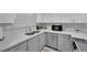 Modern kitchen with white cabinets, stainless steel appliances, and plenty of counter space at 2080 Karen Ave # 1, Las Vegas, NV 89169