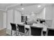 Modern kitchen featuring stainless steel appliances, white cabinets, and light countertops at 2080 Karen Ave # 1, Las Vegas, NV 89169