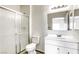 This bathroom has a walk-in shower, vinyl flooring, and a bright white vanity at 2117 Echo Bay St # 102, Las Vegas, NV 89128