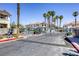 Community entrance gate with mature landscaping and security gate at 2117 Echo Bay St # 102, Las Vegas, NV 89128