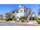 Charming condo building showcasing well-kept grounds with mature landscaping and inviting curb appeal at 2117 Echo Bay St # 102, Las Vegas, NV 89128