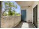 This patio offers a private outdoor space with views of a lush tree at 2117 Echo Bay St # 102, Las Vegas, NV 89128