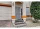 Close-up of a charming front entrance with a secure gate and a welcoming 'WELCOME' sign at 2130 Trebbiano Way, Las Vegas, NV 89156