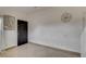 Entryway/Living room showcasing neutral walls, tile flooring, and minimalist decorations at 2130 Trebbiano Way, Las Vegas, NV 89156