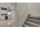 View of the stairway and kitchen, showcasing a modern design and convenient layout at 2130 Trebbiano Way, Las Vegas, NV 89156
