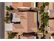 Drone shot directly above the property highlighting roof design, backyard patio, landscaping, and hardscape at 2219 Sawtooth Mountain Dr, Henderson, NV 89044