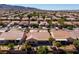 Spacious one-story home featuring desert landscaping, a tile roof, and a covered patio for outdoor relaxation at 2219 Sawtooth Mountain Dr, Henderson, NV 89044