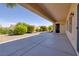Covered patio offering a relaxing outdoor space with neat landscaping and a clear sky at 2219 Sawtooth Mountain Dr, Henderson, NV 89044