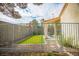 Backyard featuring a grassy area and a covered patio, perfect for outdoor living at 2251 Van Gogh Dr, Henderson, NV 89074
