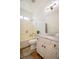 Well-lit bathroom featuring a tub and vanity with a lavender countertop at 2251 Van Gogh Dr, Henderson, NV 89074