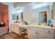 Spacious bathroom with dual sinks, marble tile shower and access to walk-in closet at 2251 Van Gogh Dr, Henderson, NV 89074