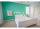 Bright bedroom featuring a white bed frame against an accent wall at 2251 Van Gogh Dr, Henderson, NV 89074