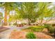 Picturesque community area with walking paths, benches, and beautiful landscaping, creating a serene environment at 2251 Van Gogh Dr, Henderson, NV 89074