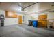 Spacious garage with storage cabinets and a clean, finished floor at 2251 Van Gogh Dr, Henderson, NV 89074