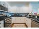 Bright kitchen featuring stainless steel appliances, ample cabinetry, and sleek countertop at 2251 Van Gogh Dr, Henderson, NV 89074