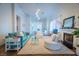 Bright living room featuring a fireplace, comfortable seating, and an open layout for easy entertaining at 2251 Van Gogh Dr, Henderson, NV 89074