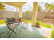 Cozy covered patio with comfortable seating, ideal for relaxation at 2251 Van Gogh Dr, Henderson, NV 89074
