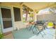 Inviting covered patio with outdoor seating, perfect for enjoying fresh air and outdoor dining experiences at 2251 Van Gogh Dr, Henderson, NV 89074