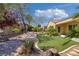 Beautiful backyard featuring artificial turf and hardscape, perfect for outdoor living at 2295 Otter Rock Ave, Henderson, NV 89044