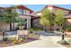 Landscaped view of Fitness and Activities center with stone accents and well-maintained grounds at 2295 Otter Rock Ave, Henderson, NV 89044