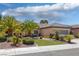 Beautiful single-story house with desert landscaping, a tile roof, and a well-maintained front yard at 2295 Otter Rock Ave, Henderson, NV 89044