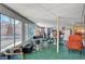 Spacious sunroom features an indoor/outdoor feel, ceiling fan and many seating options at 2325 Sombrero Dr, Las Vegas, NV 89169