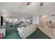Spacious living room with couches, tile floors and views of the kitchen and adjoining rooms at 2325 Sombrero Dr, Las Vegas, NV 89169