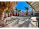 Backyard pool and patio area with mature landscaping at 2325 Sombrero Dr, Las Vegas, NV 89169