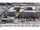 Stunning aerial view of Las Vegas Blvd condo building featuring a community pool and perfectly manicured grounds at 2455 W Serene Ave # 923, Las Vegas, NV 89123