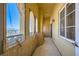 A private balcony offers city views, wood-style tile flooring, and a decorative screen at 2455 W Serene Ave # 923, Las Vegas, NV 89123