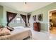 A stylish bedroom with views features light green paint and marble floors at 2455 W Serene Ave # 923, Las Vegas, NV 89123