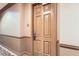 Unit 923 front door inside hallway with carpet and base trim at 2455 W Serene Ave # 923, Las Vegas, NV 89123