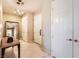 Inviting hallway with elegant marble flooring and a decorative table near the entry door at 2455 W Serene Ave # 923, Las Vegas, NV 89123