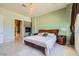 Bright main bedroom featuring a decorative fireplace, sleek marble floors, and calming paint at 2455 W Serene Ave # 923, Las Vegas, NV 89123